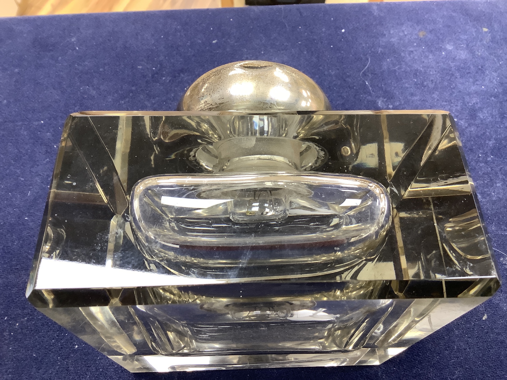 A George V large silver topped glass inkwell, makers mark C and co-, London 1912, 12.5 cm wide